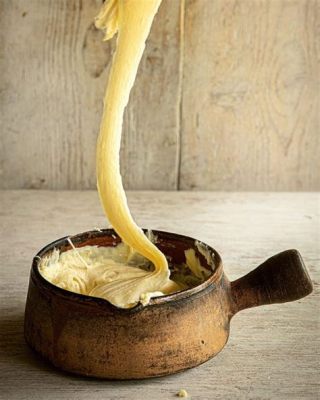   Aligot: Een Romige Toverspreuk Met Knoflook En Geëlste Kaas